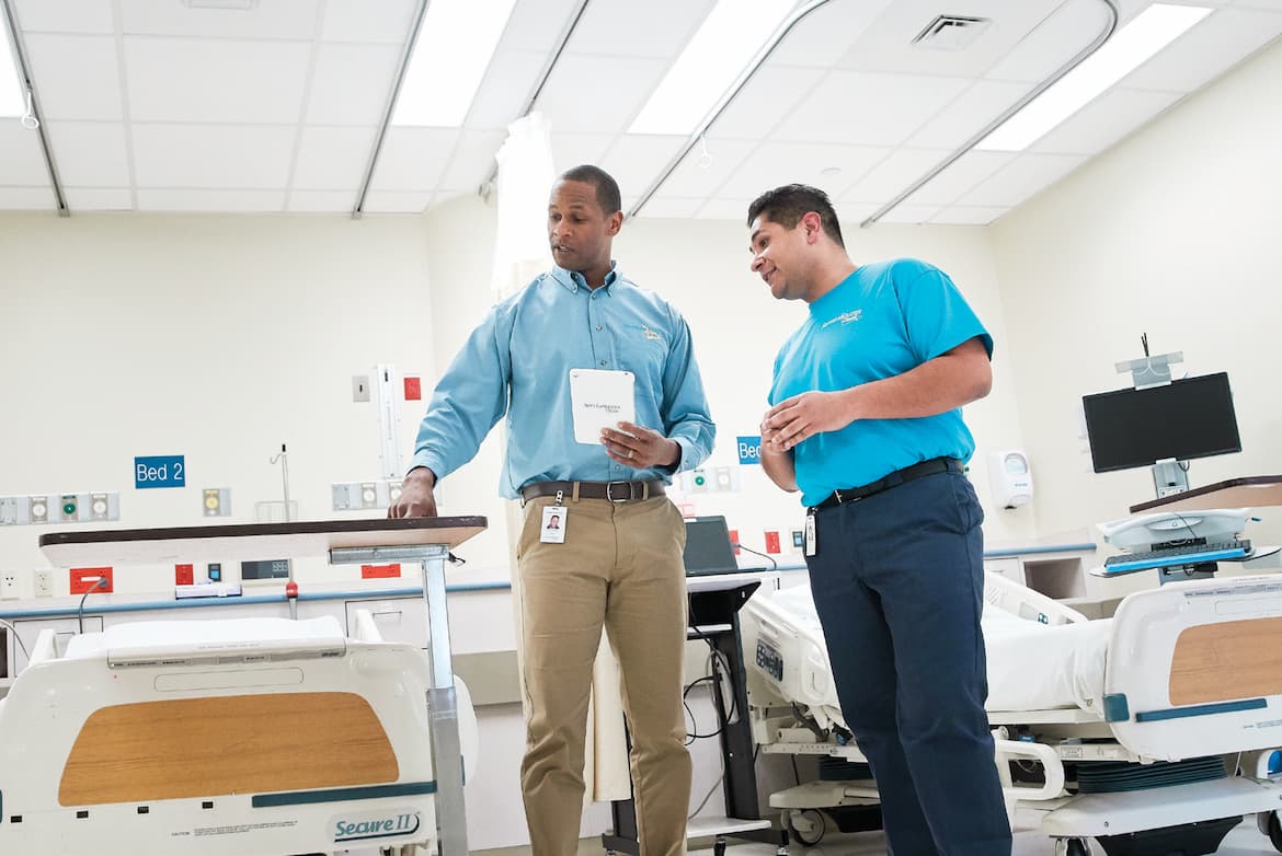 Healthcare Cleaning & Environmental Service provider explaining the hospital staff